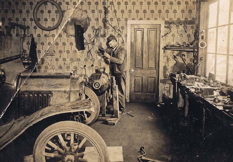 Fred Dresselhaus working in his shop, ca1915/20