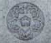 R N A flower design emblem engraved on tombstone