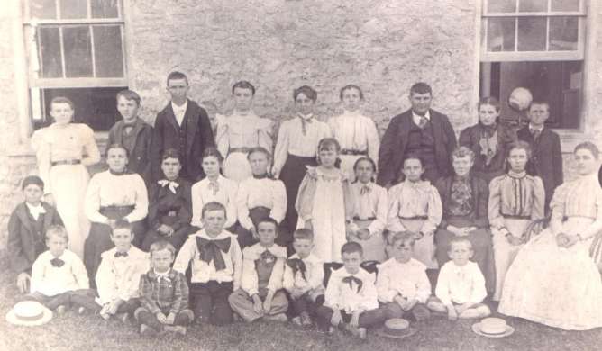 Village Creek school children & teacher 1899